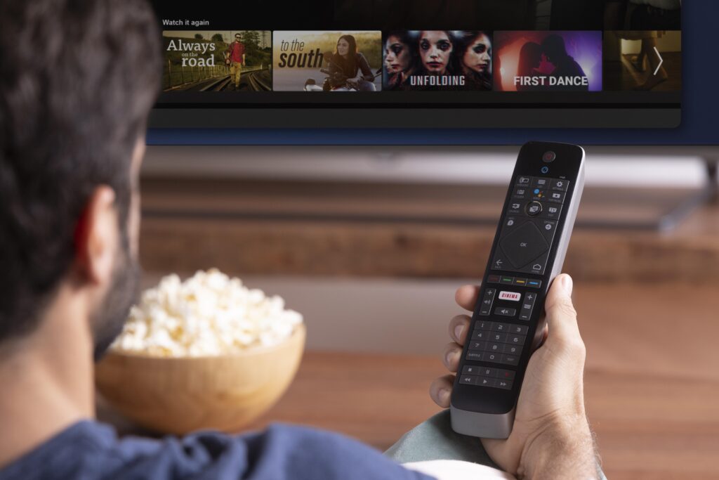 man watching show his tv